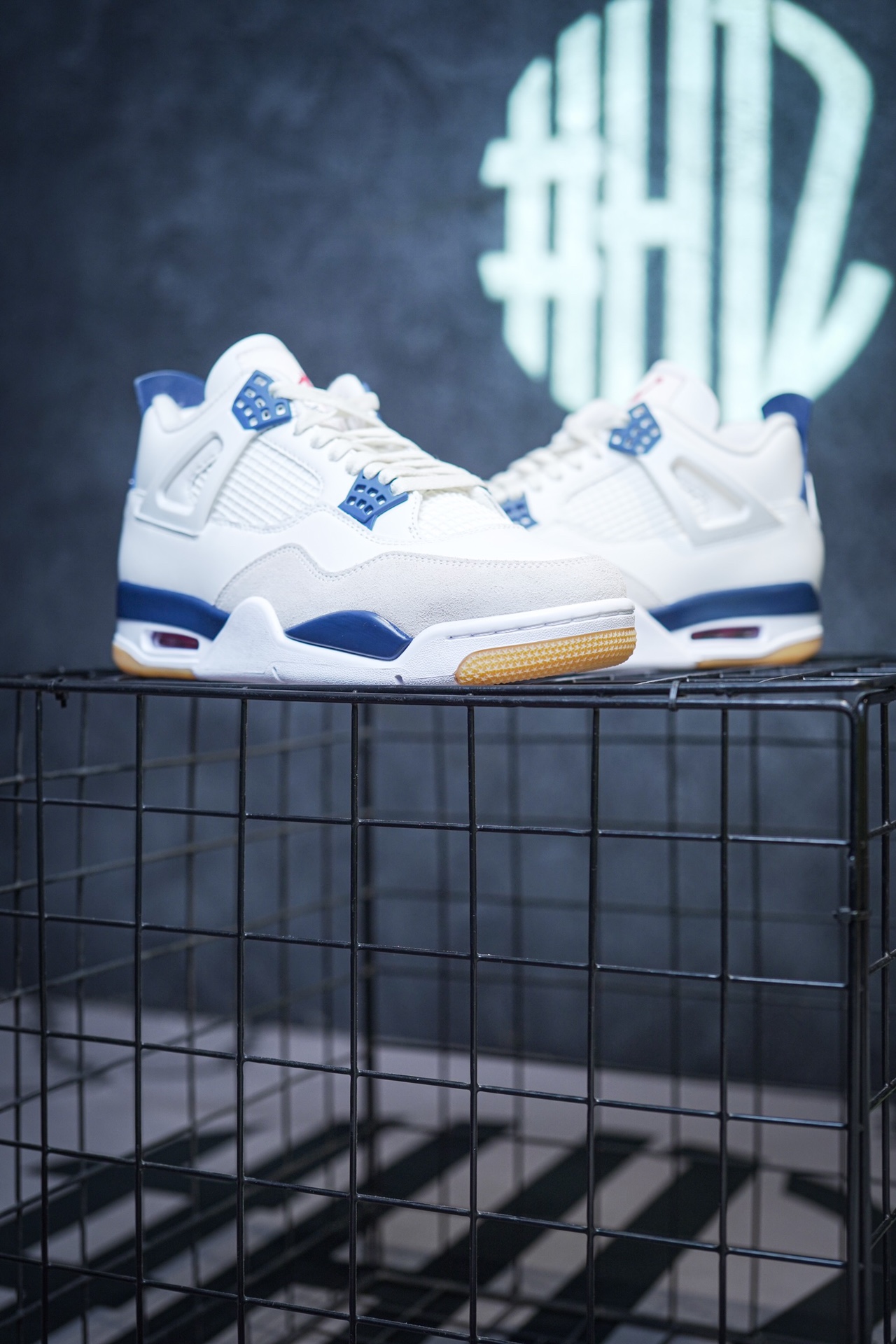 NK SB x Air Jordan 4 'Navy' collaboration in white and blue.