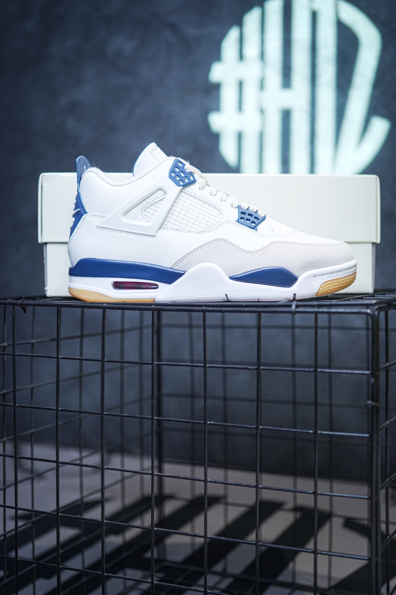 NK SB x Air Jordan 4 'Navy' collaboration in white and blue.