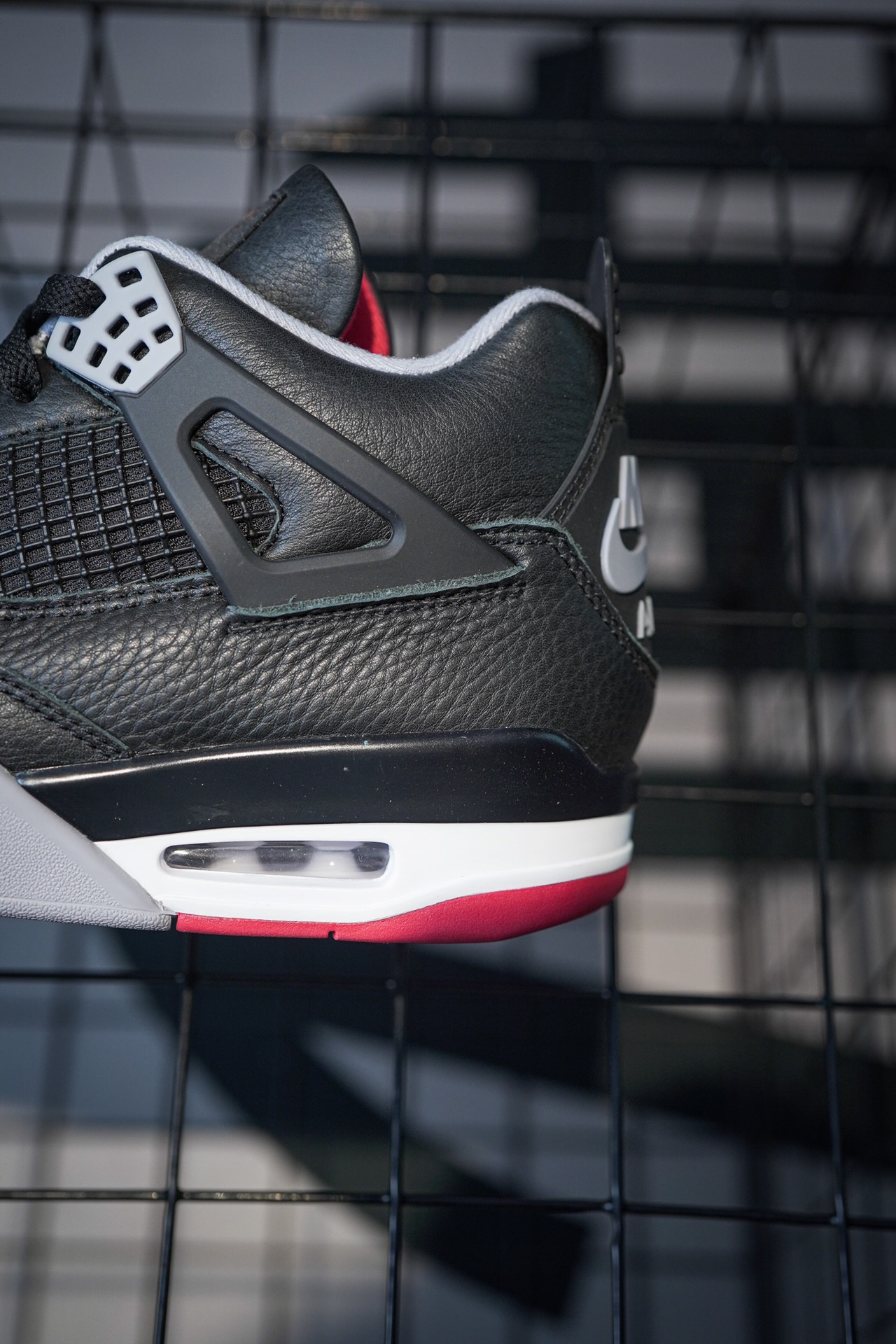Air Jordan 4 'Bred Reimagined' black and red leather 2024