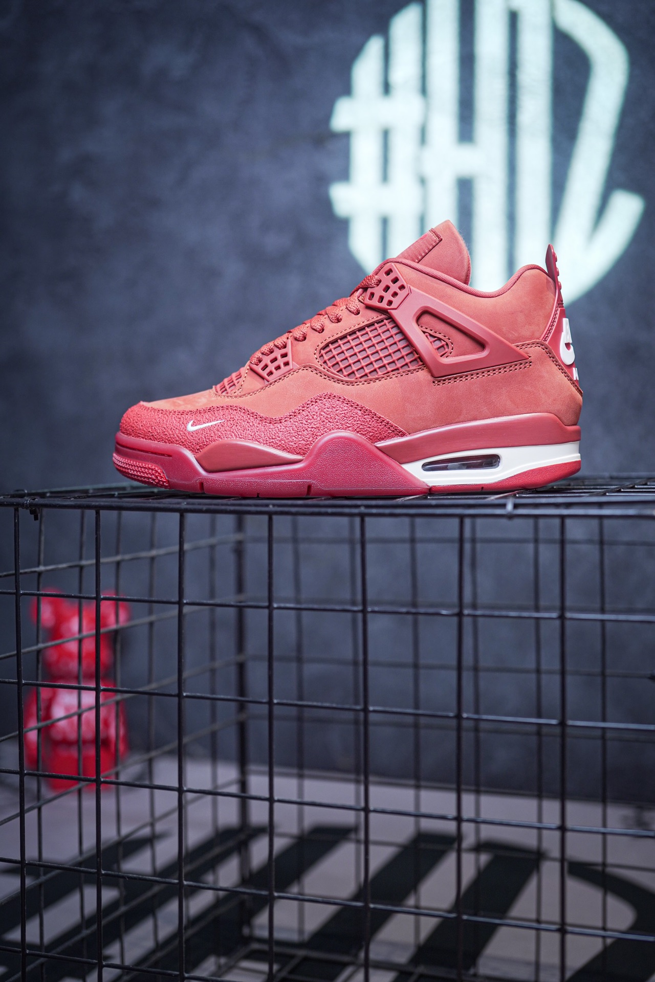 NK SB x Air Jordan 4 collaboration in white and red, military green, gray and brown, and red brick.