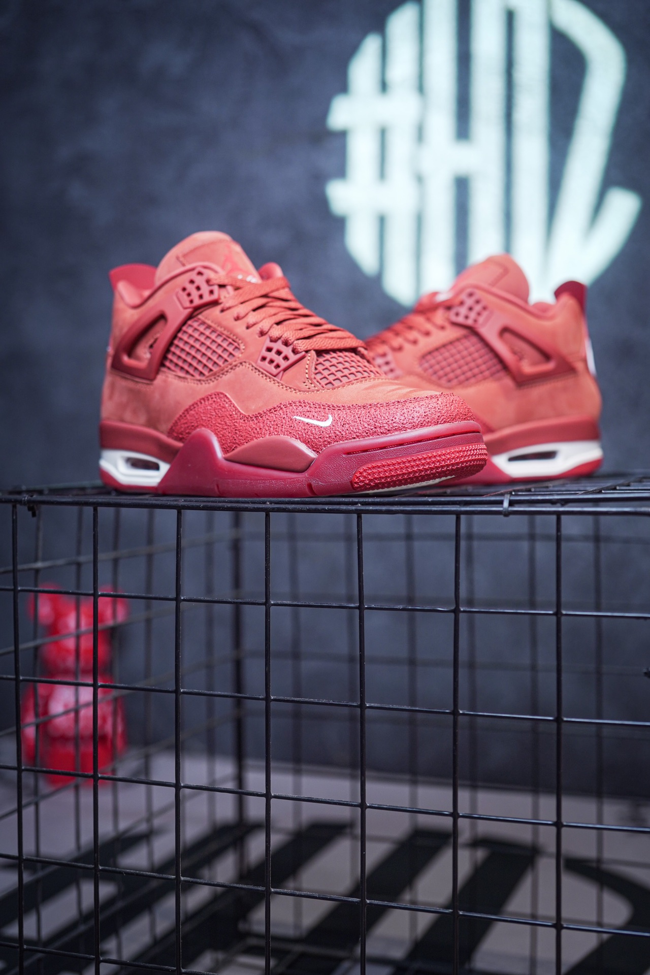 NK SB x Air Jordan 4 collaboration in white and red, military green, gray and brown, and red brick.