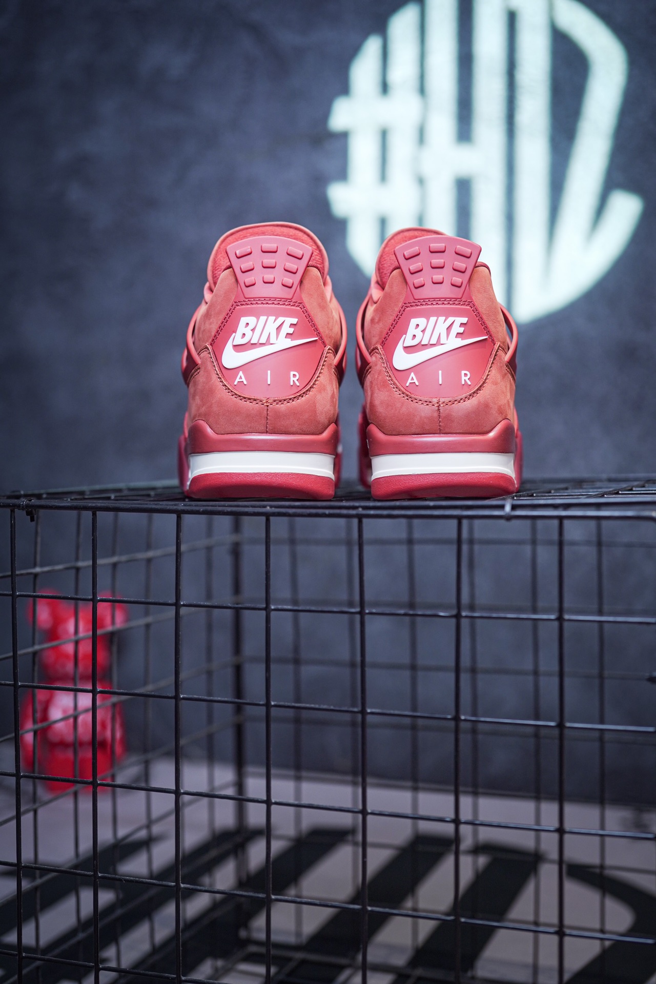 NK SB x Air Jordan 4 collaboration in white and red, military green, gray and brown, and red brick.