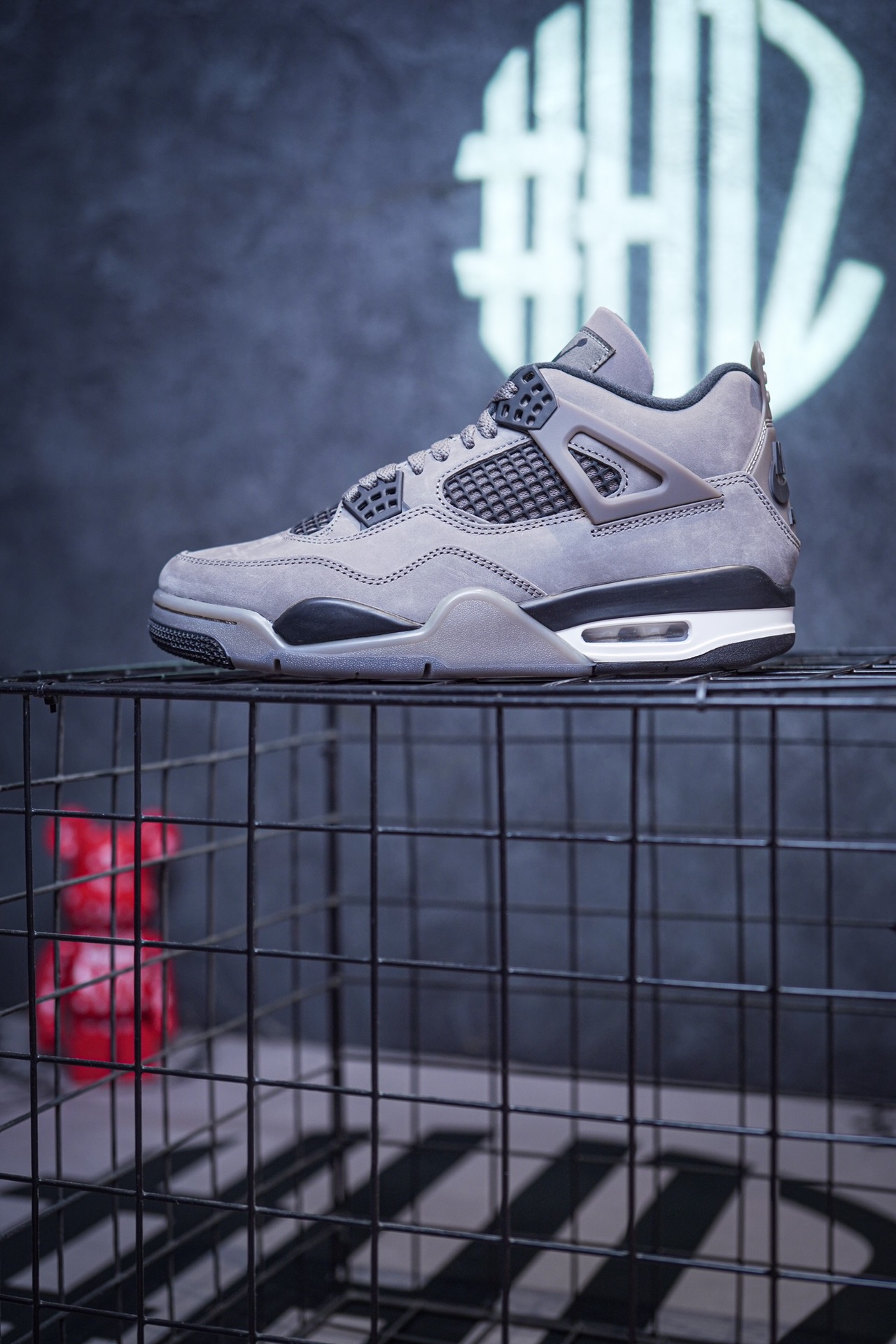 NK SB x Air Jordan 4 collaboration in white and red, military green, gray and brown, and red brick.