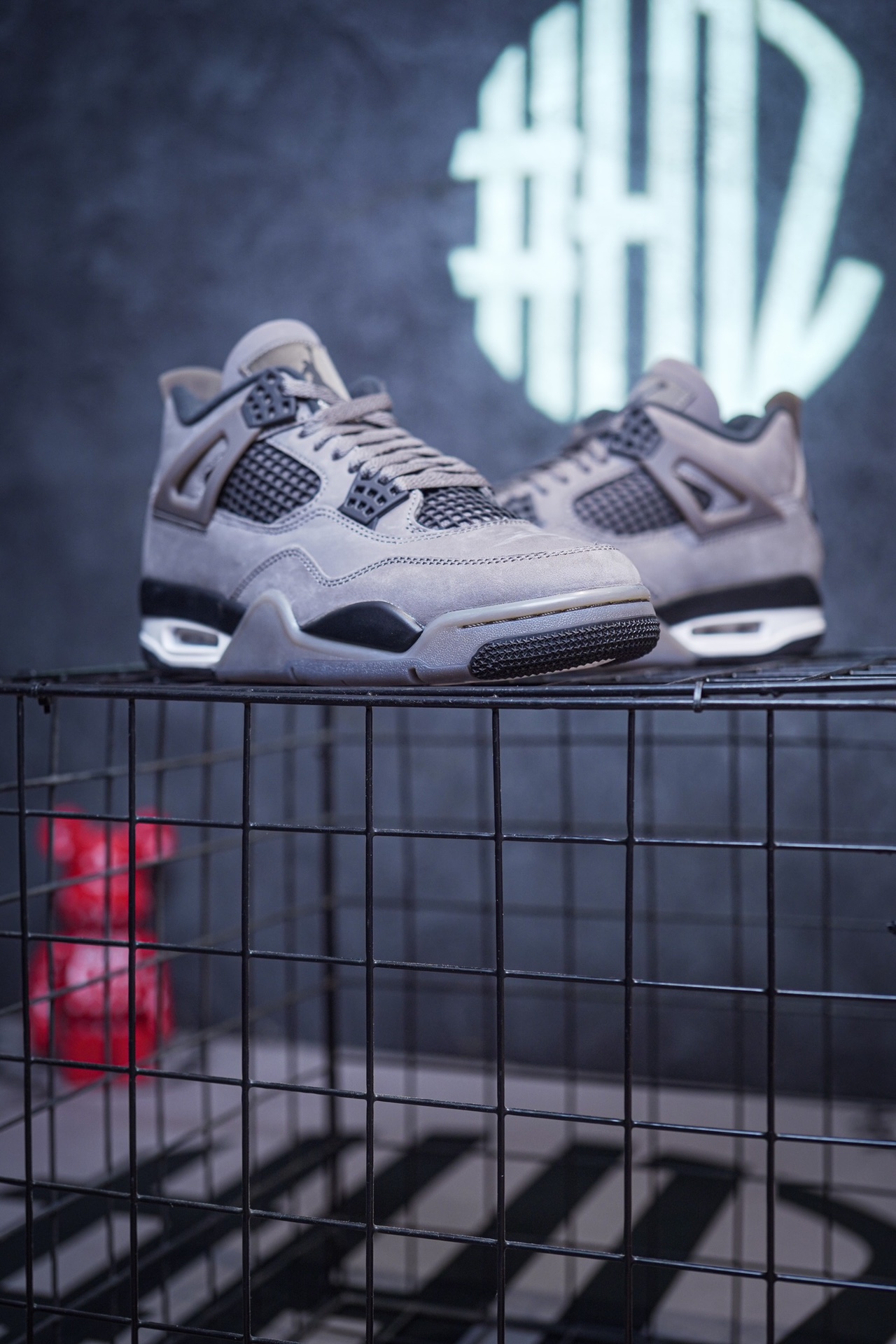 NK SB x Air Jordan 4 collaboration in white and red, military green, gray and brown, and red brick.
