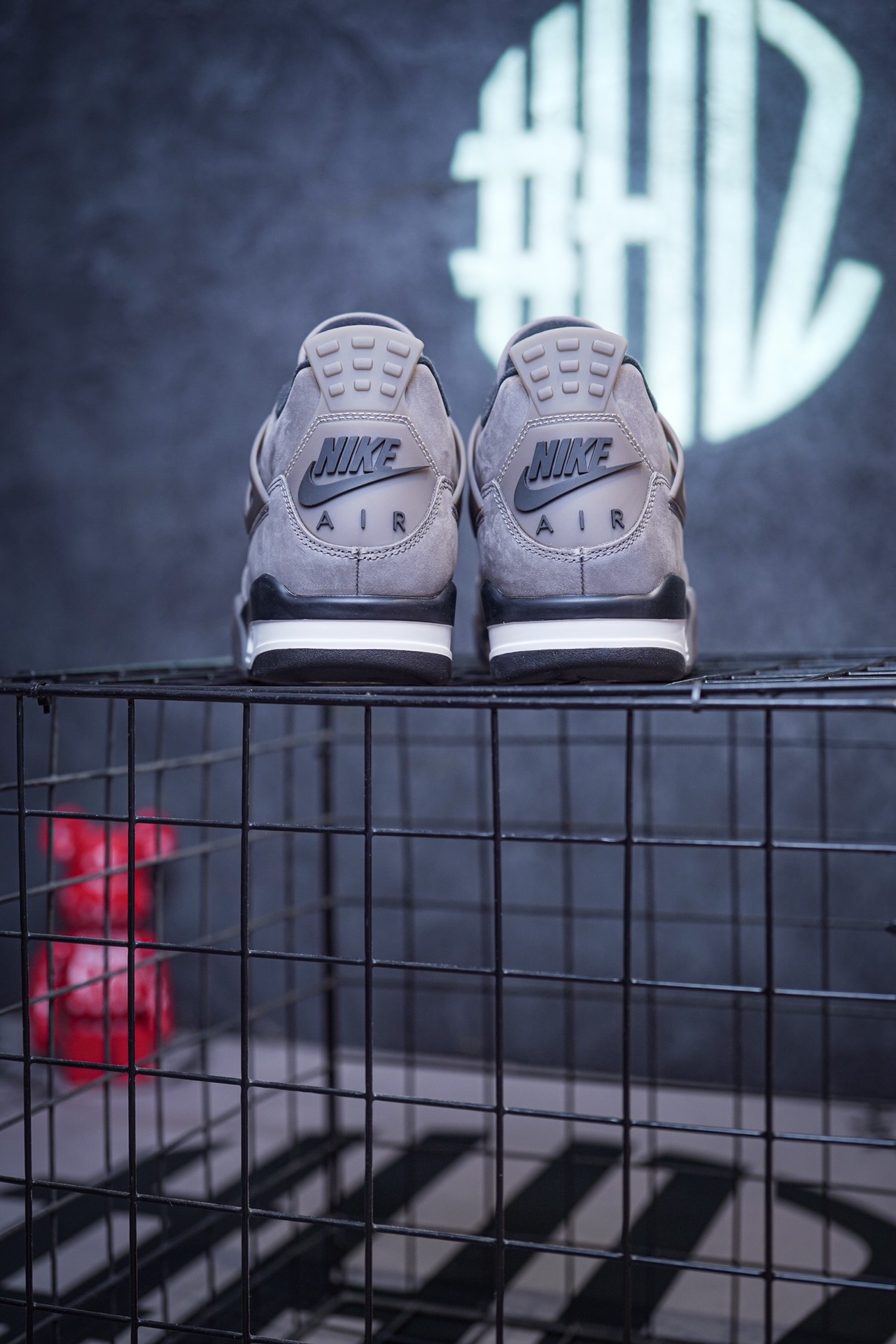 NK SB x Air Jordan 4 collaboration in white and red, military green, gray and brown, and red brick.