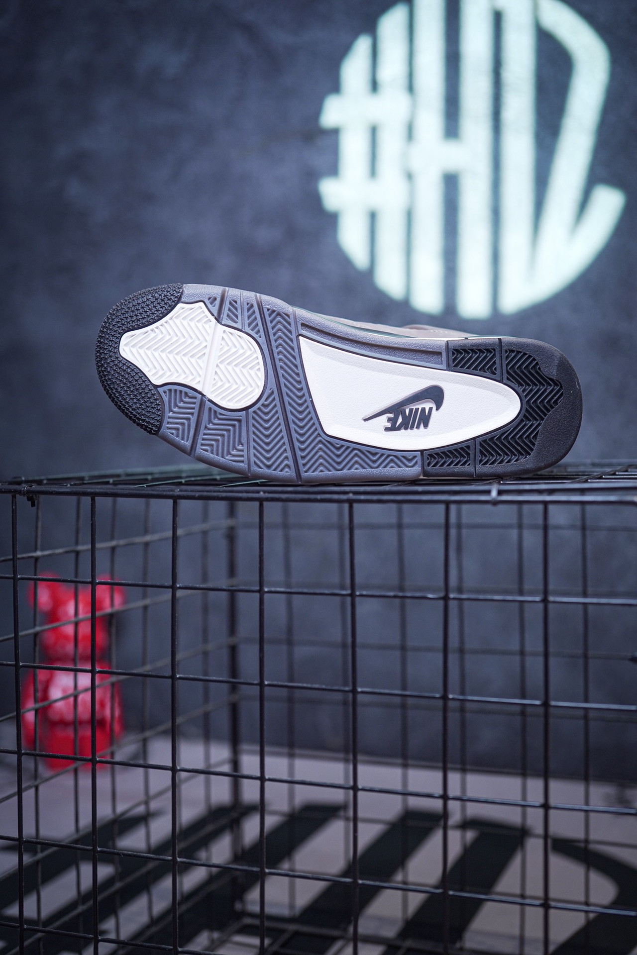 NK SB x Air Jordan 4 collaboration in white and red, military green, gray and brown, and red brick.