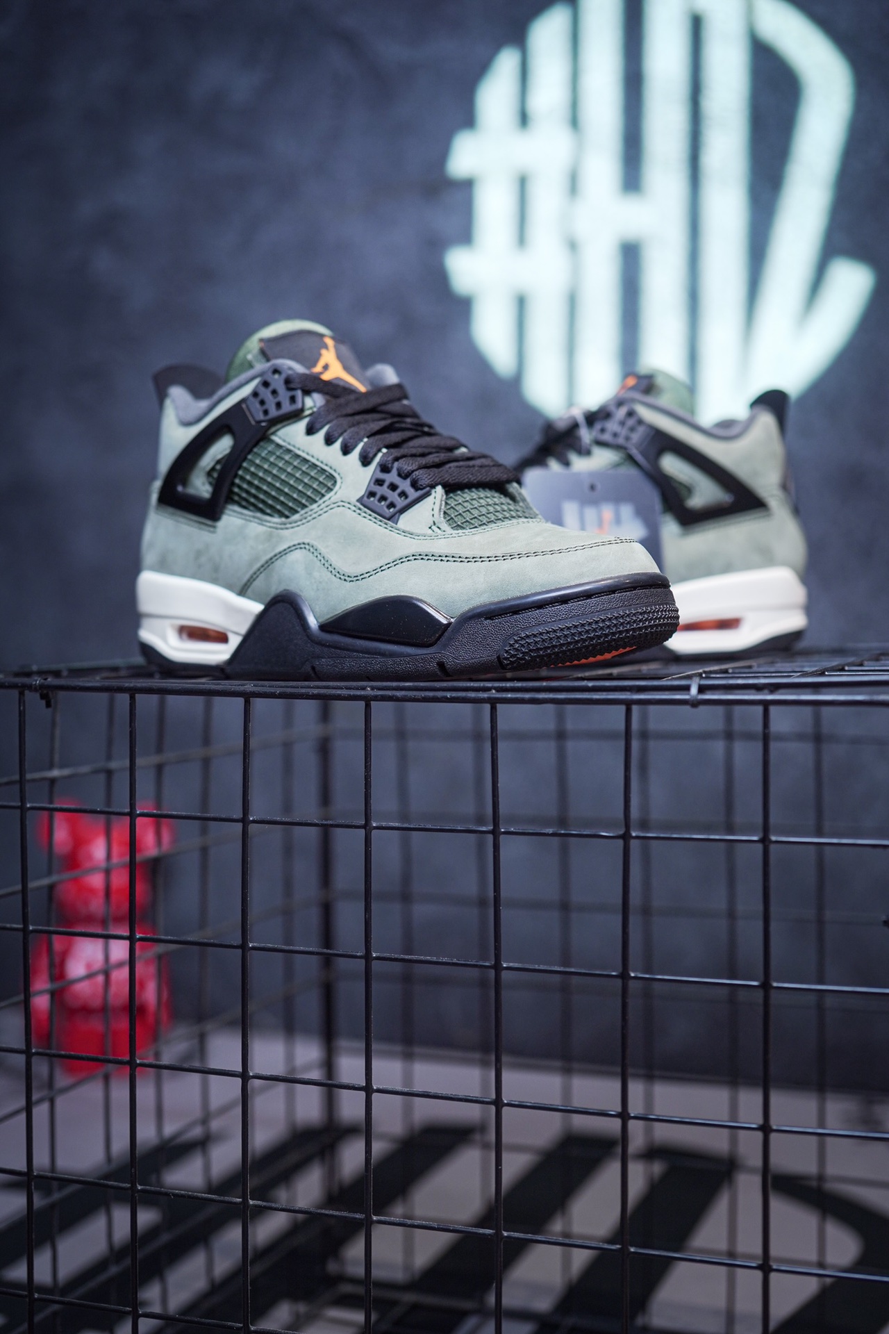 NK SB x Air Jordan 4 collaboration in white and red, military green, gray and brown, and red brick.