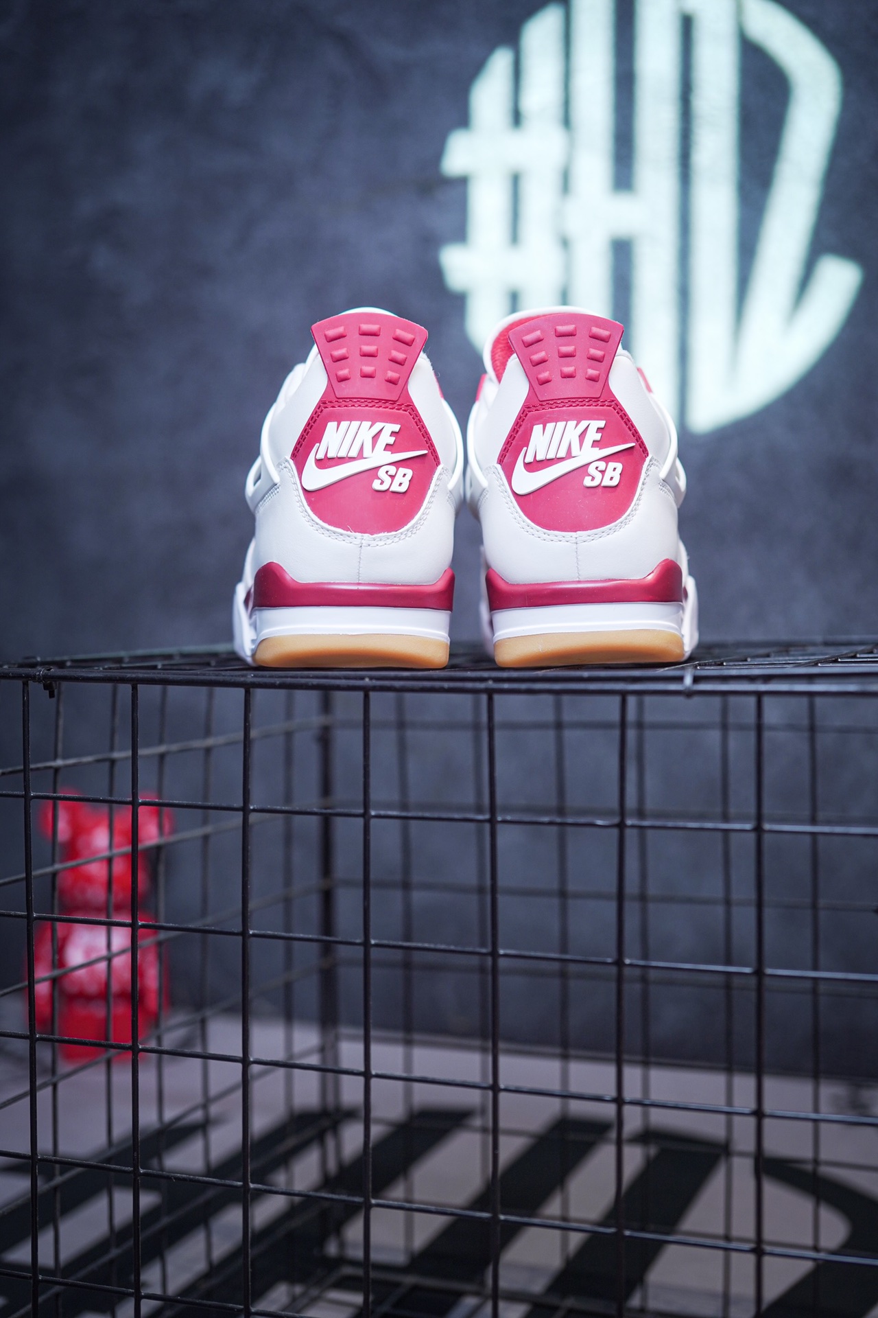 NK SB x Air Jordan 4 collaboration in white and red, military green, gray and brown, and red brick.