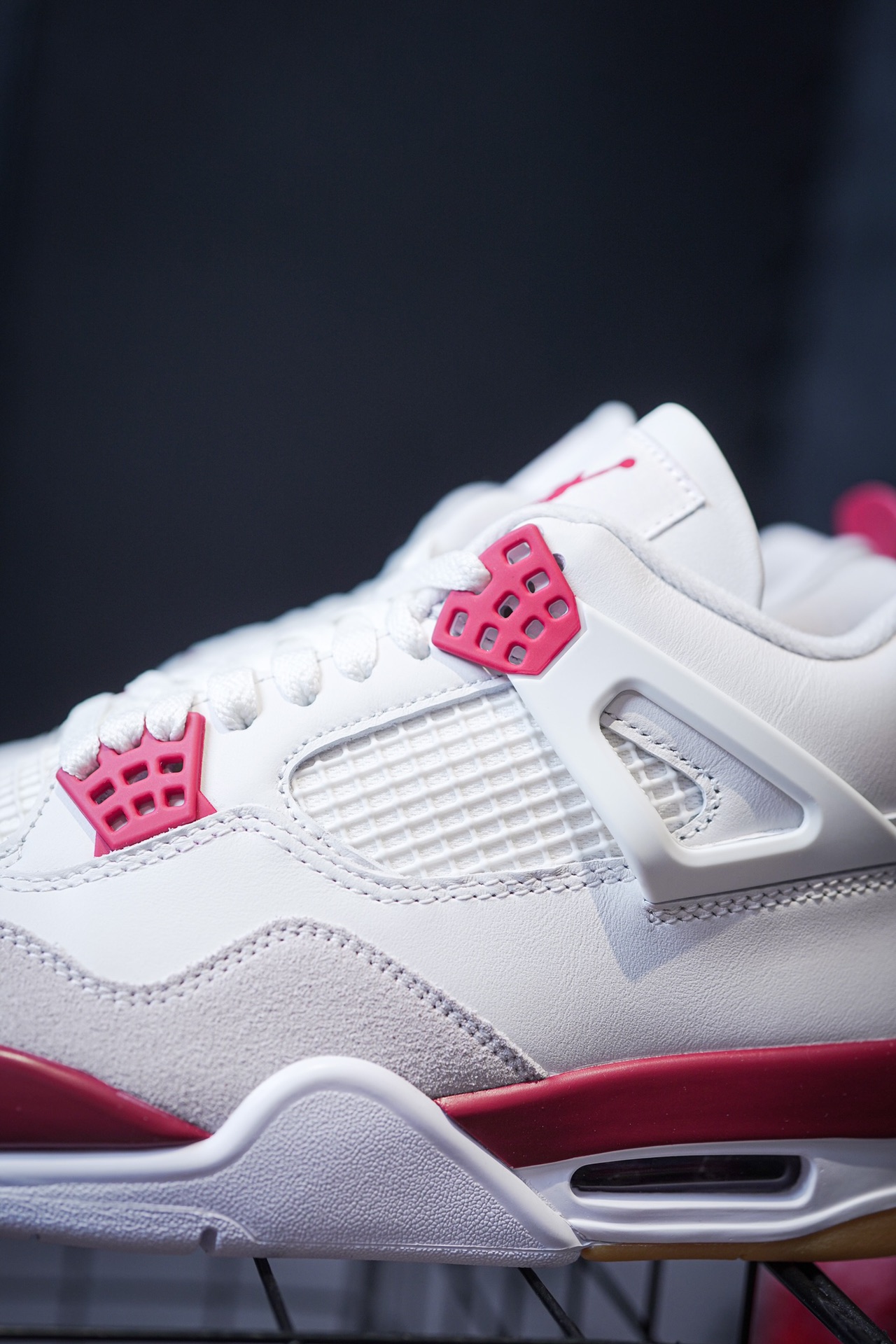 NK SB x Air Jordan 4 collaboration in white and red, military green, gray and brown, and red brick.