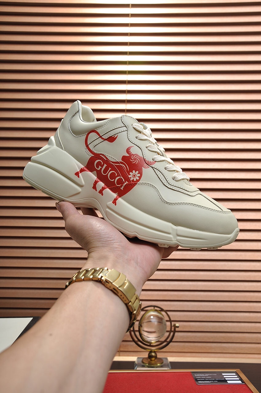 Gucci couple's collection red bull print