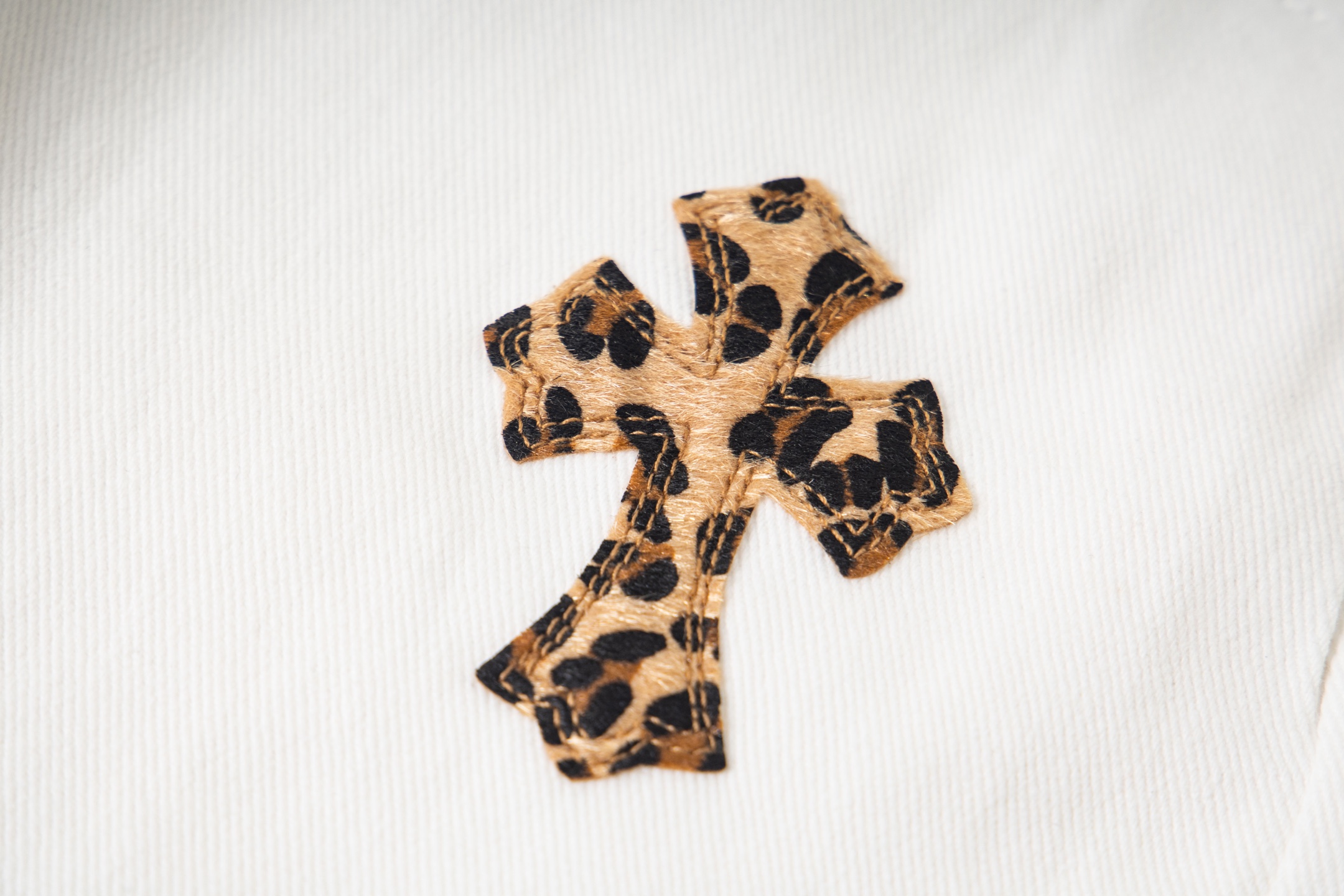 Chrome Hearts Mattyboy graffiti painted leopard print cross denim pants, unisex style